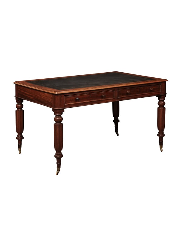 English 19th Century Partner's Mahogany Writing Table with Embossed Black Leather Top, 4 Drawers and Turned Legs Ending on Castor Feet