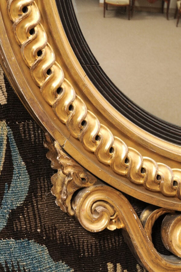 Early 19th Century English Large Bull's Eye Convex Mirror with Eagle Crest Resting on Rocks and Ebonized Reeded Banding. - Image 11