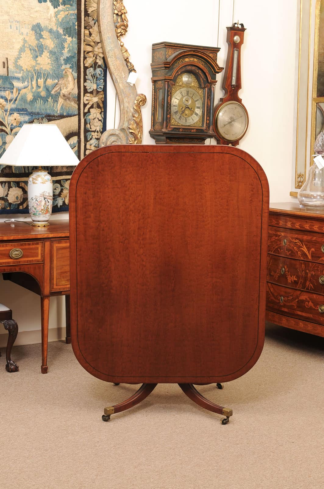 English 19th Century Plum Pudding Mahogany Rectangular Breakfast Table with Ebonized Inlay and Pedestal Base and 4 Splayed Legs on Brass Castor Feet - Image 5