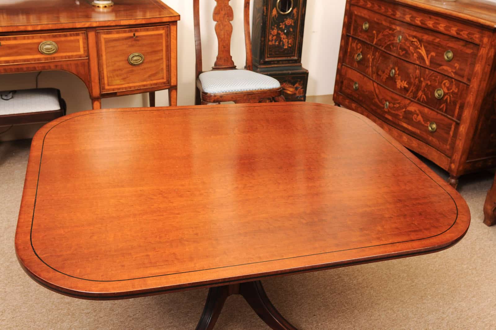 English 19th Century Plum Pudding Mahogany Rectangular Breakfast Table with Ebonized Inlay and Pedestal Base and 4 Splayed Legs on Brass Castor Feet - Image 10