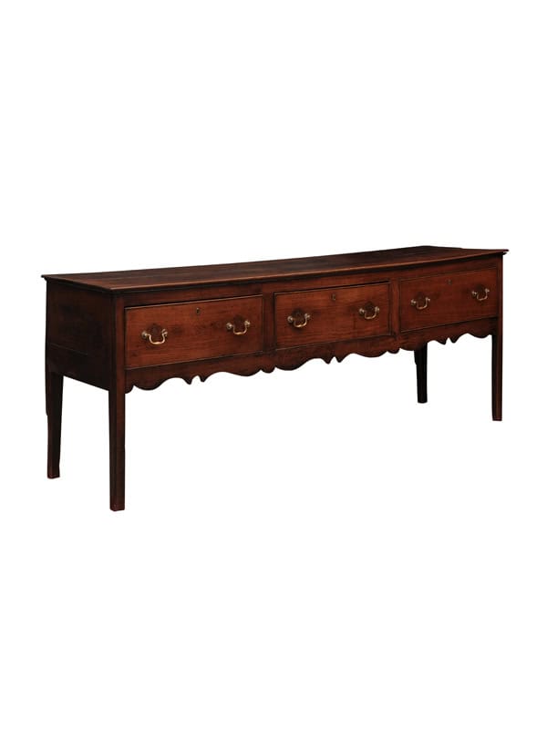 English Late 18th Century Dresser Base with 3 Drawers, Brass Bail Pulls and Shaped Apron
