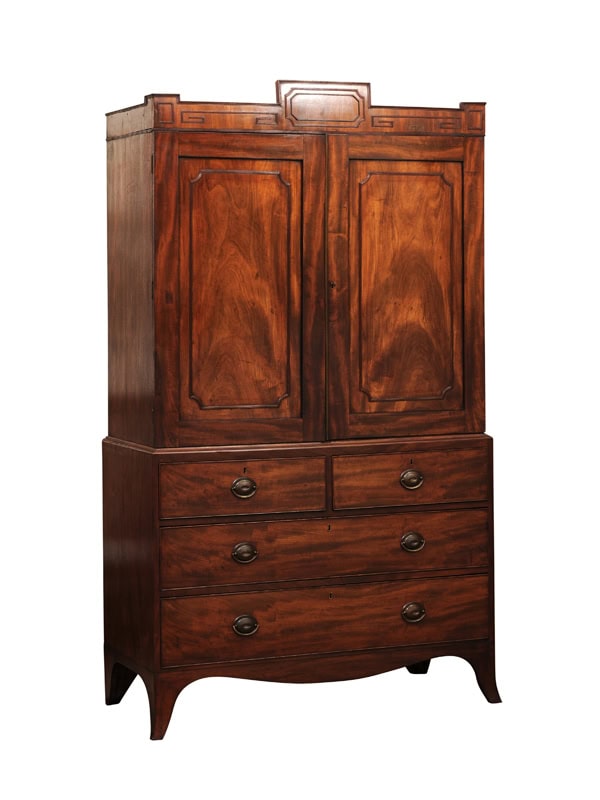 19th Century English Mahogany Linen Press with Cornice Featuring Greek Key Detail and Splayed Legs