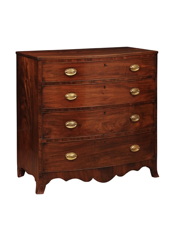 English 19th Century Mahogany Bowfront Chest with reeded edge, Graduated 4 Drawers and Shaped Apron