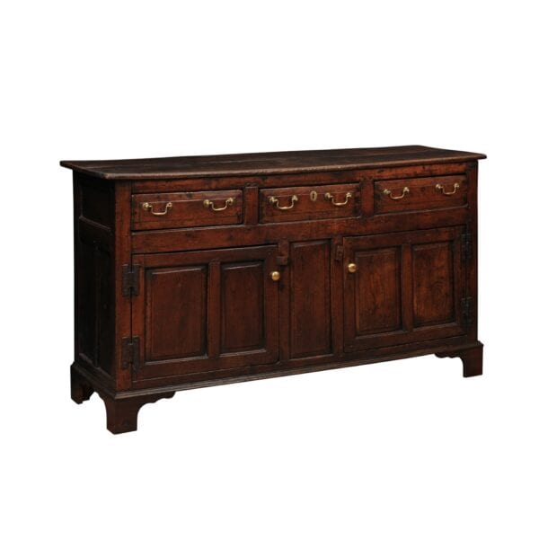 English 18th Century Oak Dresser Base Featuring 3 Drawers and 2 Flanking Cabints Below with Raised Paneled Doors and Brass Knobs - Image 2