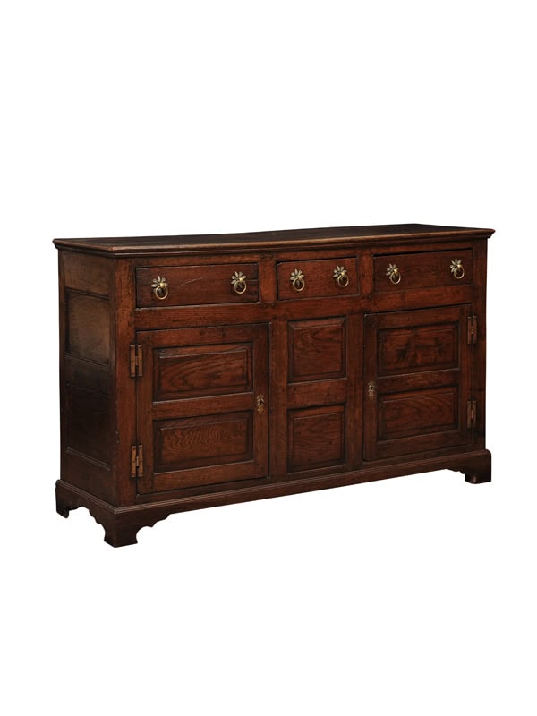 English 18th Century Dresser Base Featuring 3 Drawers with Foliage Brass Pulls and Flanking Cabinets Below