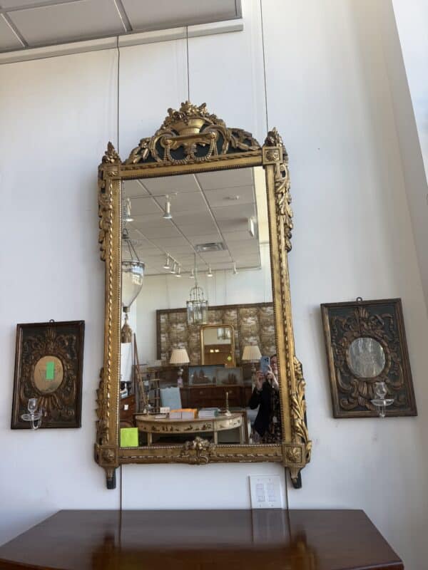 French 19th Century Louis XVI Style Giltwood Mirror with Carved Flower Basket Crest