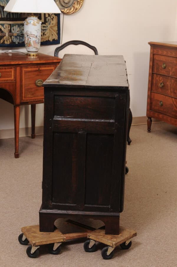 English 18th Century Oak Dresser Base Featuring 3 Drawers and 2 Flanking Cabints Below with Raised Paneled Doors and Brass Knobs - Image 11