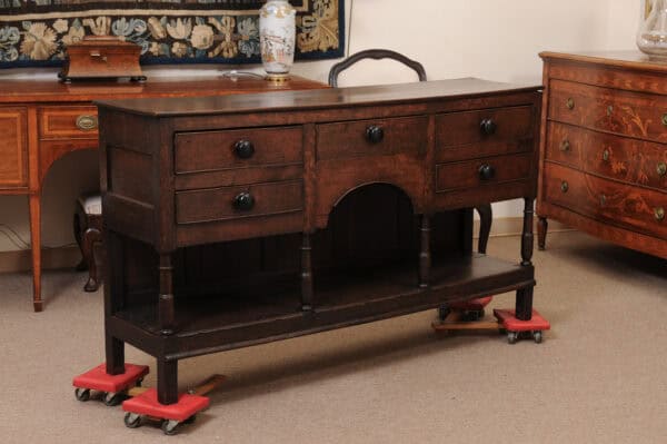 English Early 19th Century Oak Dresser Base / Server Featuring 5 Drawers with Wooden Knobs, Arched Frieze and Pot Board Below - Image 3