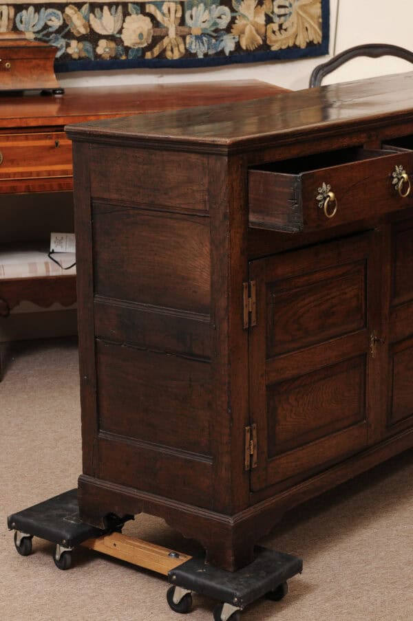 English 18th Century Dresser Base Featuring 3 Drawers with Foliage Brass Pulls and Flanking Cabinets Below - Image 4