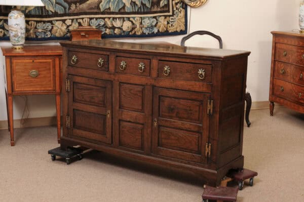 English 18th Century Dresser Base Featuring 3 Drawers with Foliage Brass Pulls and Flanking Cabinets Below - Image 12