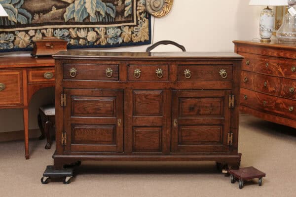 English 18th Century Dresser Base Featuring 3 Drawers with Foliage Brass Pulls and Flanking Cabinets Below - Image 13